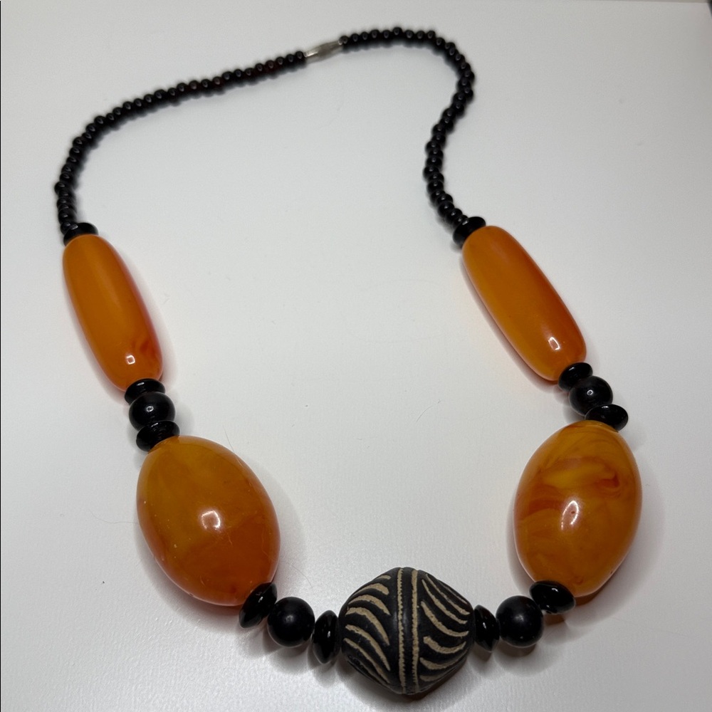 Vintage Massive lucite Orange and Black Beaded Necklace 20 inches so stunning